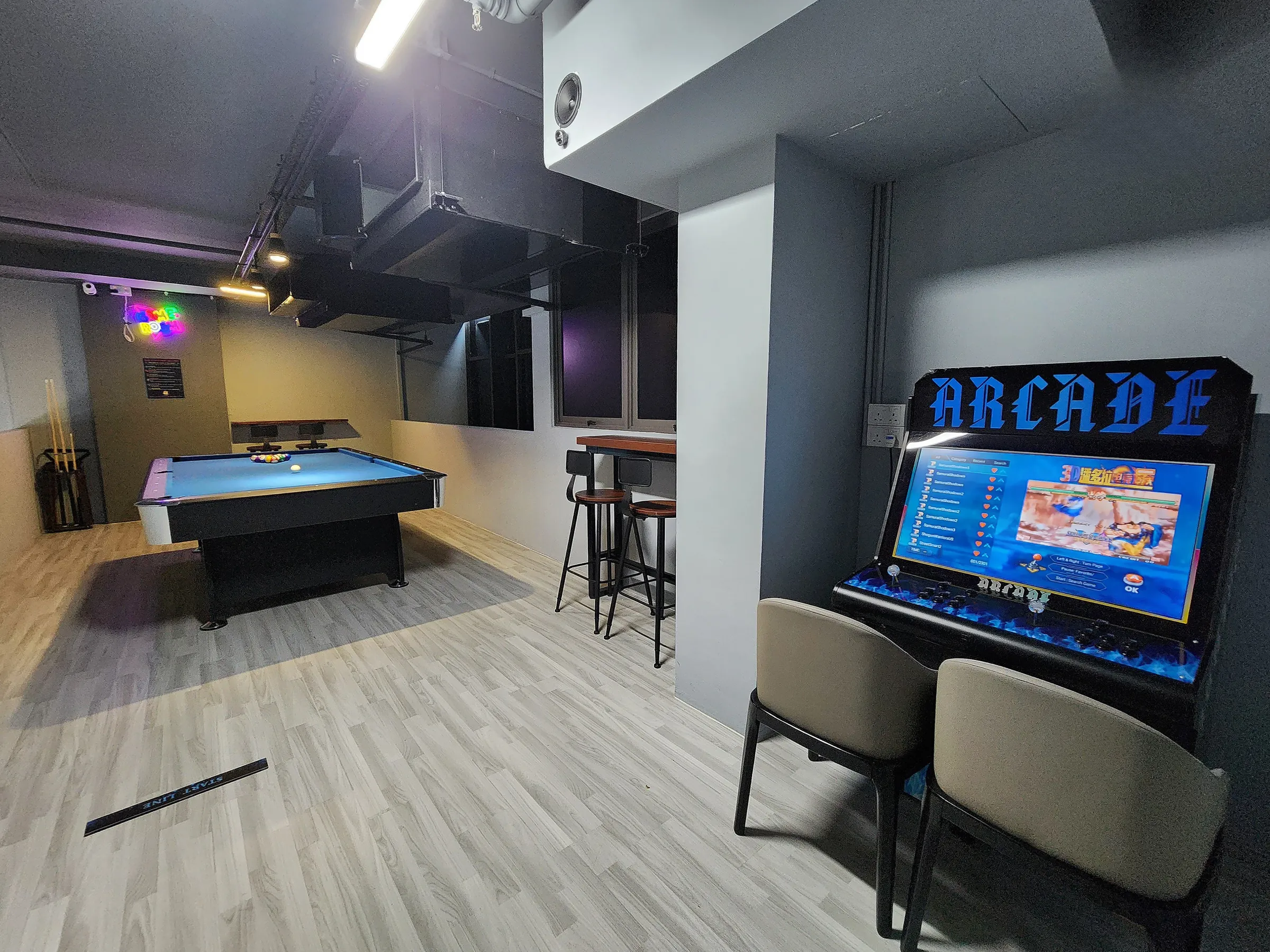 BoJioVenue mezzanine entertainment hall with pool table and arcade machine